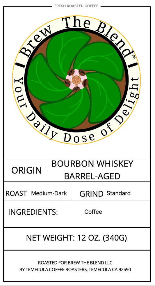 A coffee product label for Brew The Blend Bourbon Whiskey Barrel-Aged Roast, showing a circular green coffee bean graphic with a flower center and text listing origin, roast, grind, ingredients, and net weight.