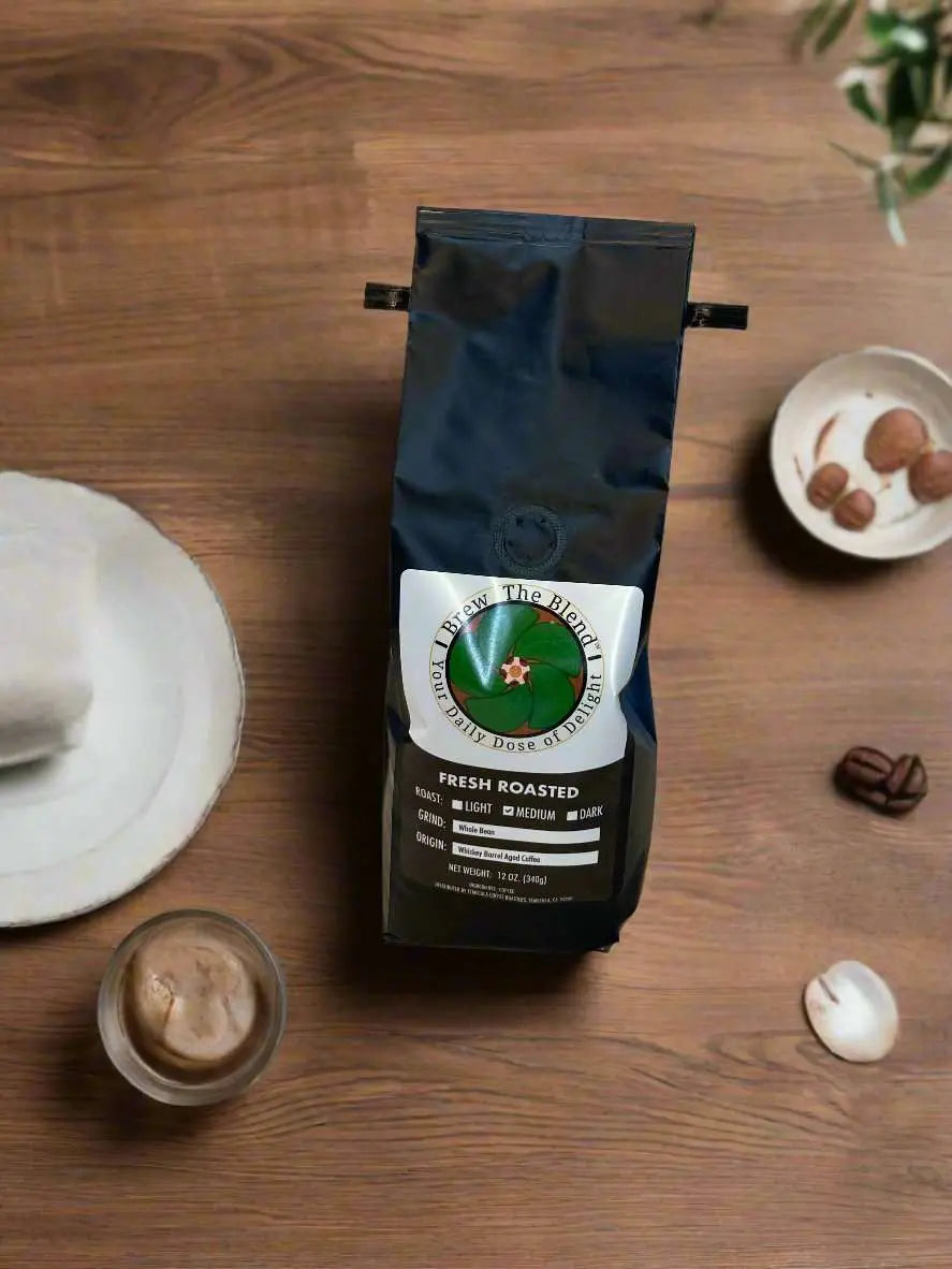 Coffee bag on a wooden table with a cup of coffee and snacks