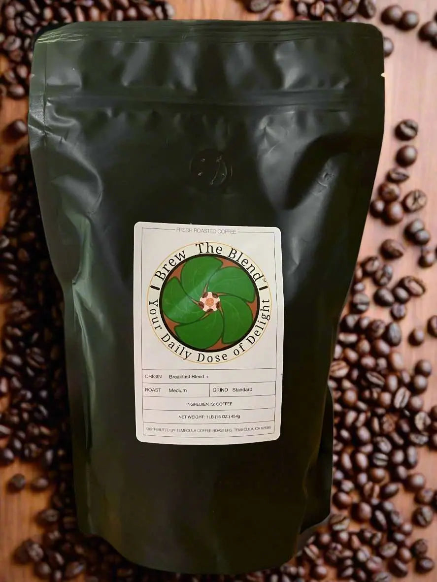 A dark green stand-up pouch of coffee with a white label reading 'I Brew The Blend I You Daily Dose of Delight,' photographed from above on a wooden surface surrounded by scattered coffee beans.